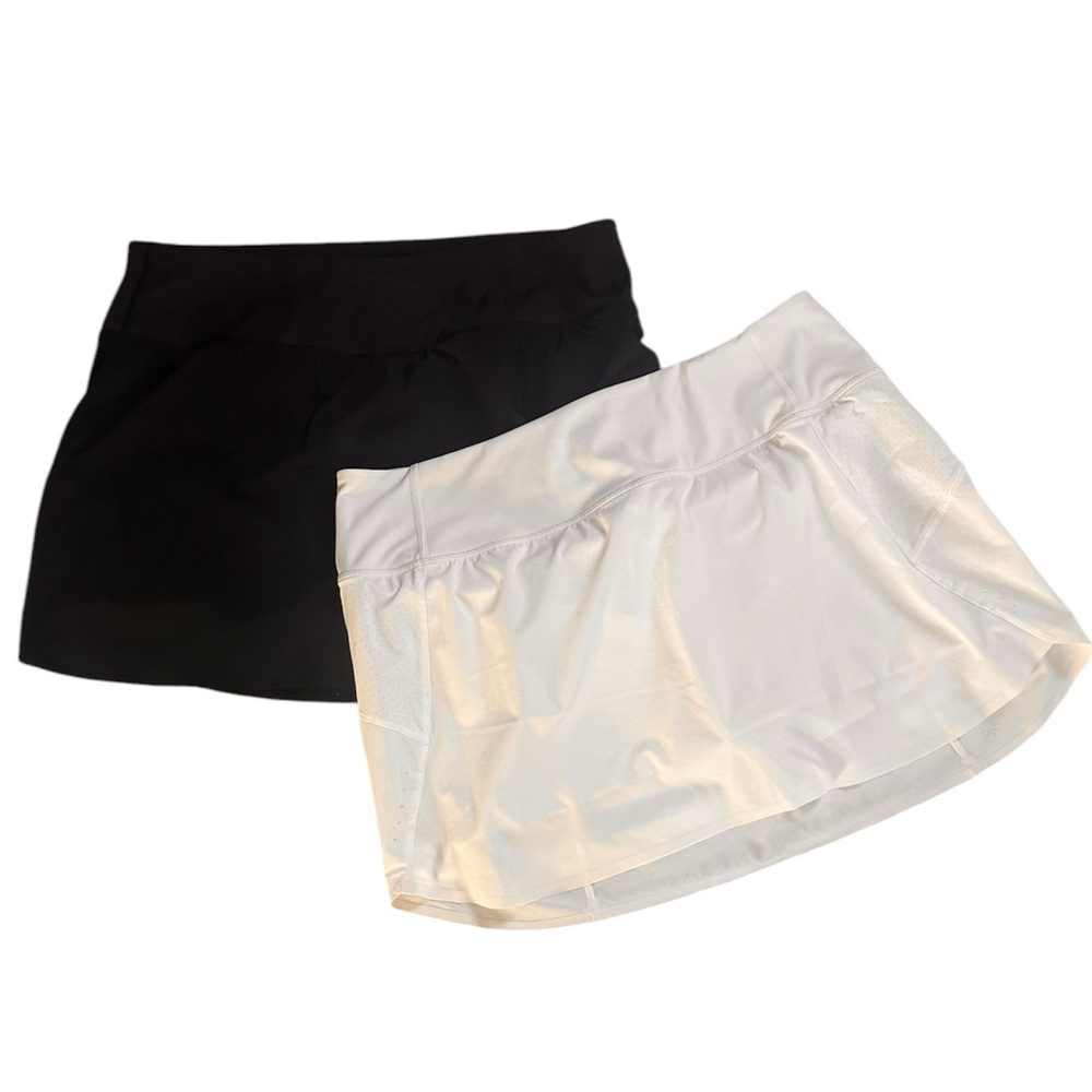 TWO Athleta “Run with it” skorts - size L